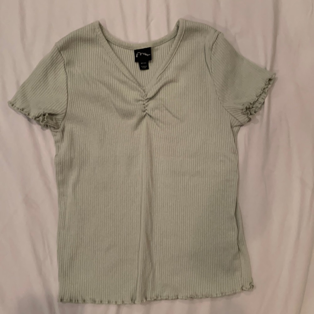 Girls light green short sleeve top size medium